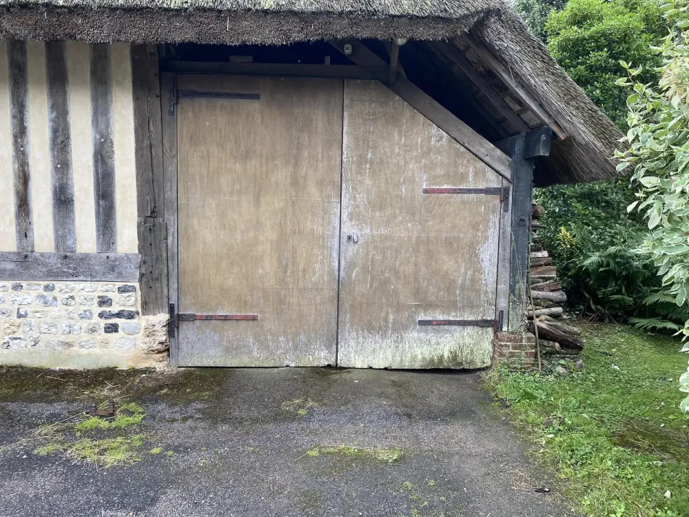 rénovation porte de garage en bois